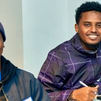 International Anchor Allies Winter 2026 First Mixer - all smiles, two male students